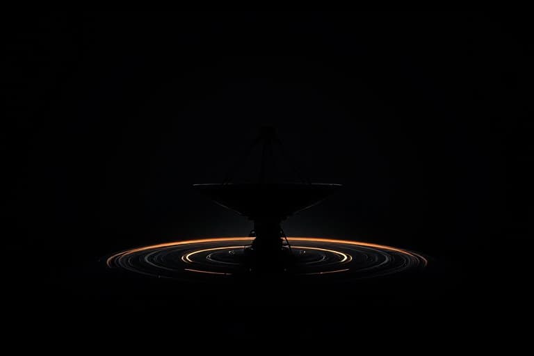 The silhouette of a vast parabolic sensor dish, faint concentric signal rings spreading outward from it into the darkness